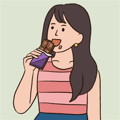 a woman eating a chocolate bar while wearing a striped shirt