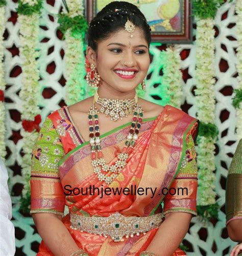 Bride in Navaratna Haram and Chandbalis Set photo | Wedding blouse designs, Trendy wedding ...