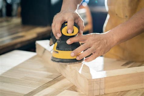 ..carpenter Use Random Orbit Sander or Palm Sander Polishes Wooden in the Workshop ,DIY Maker ...