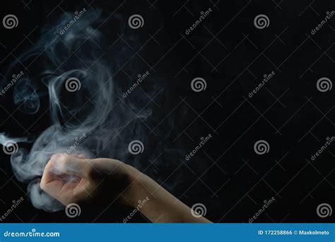 Smoke in Hand. Abstract Fog. Hand Creates a Magic Spell Stock Photo ...