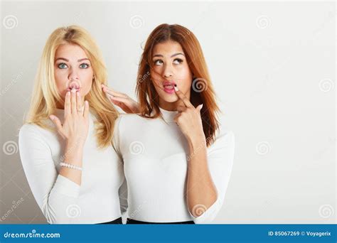 Two Ladies in Awkward Moment. Stock Image - Image of awkward, ethnic: 85067269