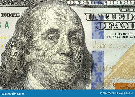 Macro Shot of a New 100 Dollar Bill, Portrait of US President Benjamin Franklin. 100 Dollar Bill ...