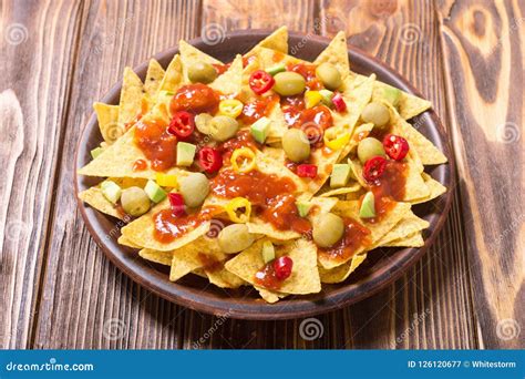 Nachos with sauce salsa stock image. Image of cuisine - 126120677