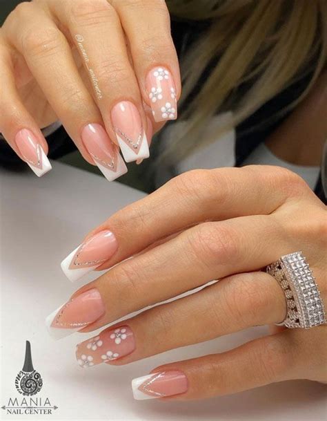 24. White Floral & French Tip Nail Design Do you realize that the power ...