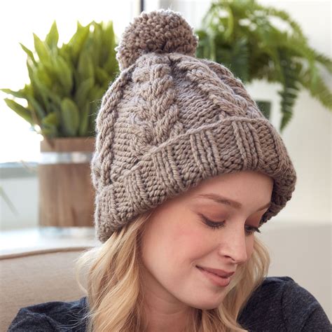 Knitting Patterns Galore - Bernat Cozy Cable Hat Cable Knit Hat Pattern ...