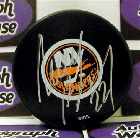 Mike Bossy autographed hockey puck (New York Islanders NHL SC2) AW ...