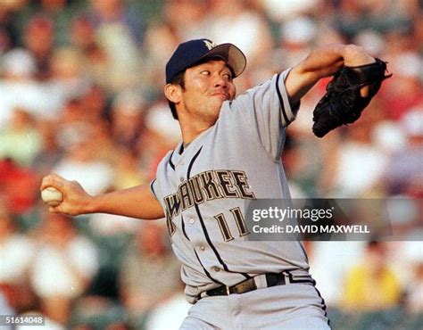 Milwaukee Brewers pitcher Hideo Nomo delivers a pitch against the ...