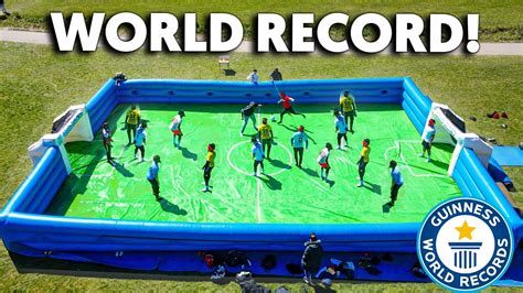 NEW WORLD RECORD SLIP ‘N’ SLIDE FOOTBALL MATCH ⚽️💦 - YouTube