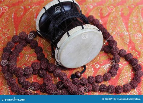 Traditional Hindu Prayer Beads Rudraksha And Musical Instrument Of God ...