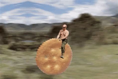 Putin Biscuit GIF - Putin Biscuit Food - Discover & Share GIFs