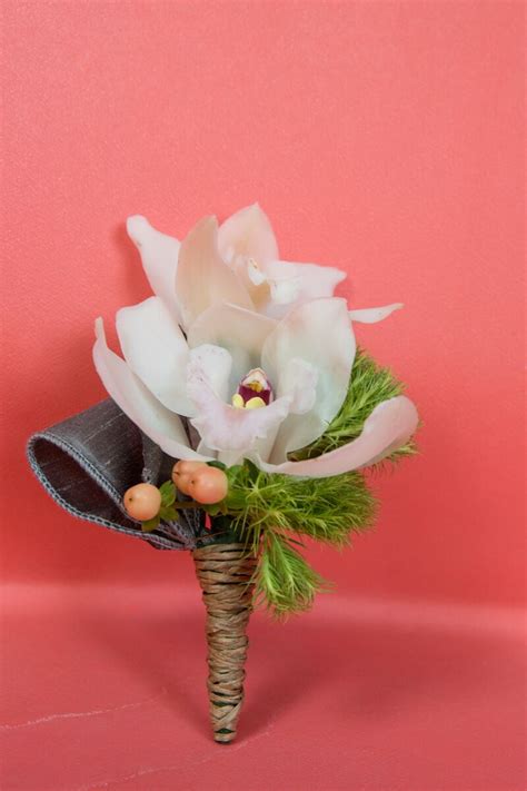 Casual and Classy Single White Orchid Groom Boutonniere