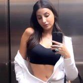 Nora Fatehi keeps it monochrome sporty chic in black bralette and white shorts : Bollywood News ...