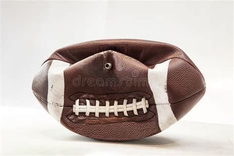 Partially Delfated Football Stock Image - Image of deflategate, scandal: 50334941