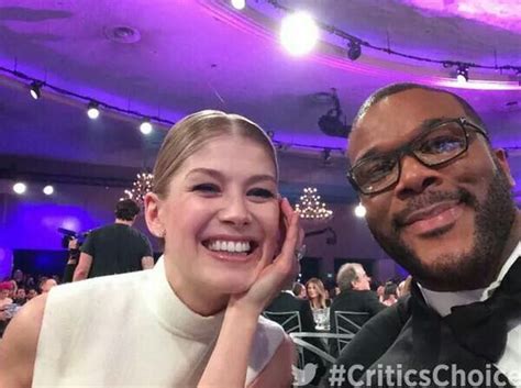 Rosamund Pike and Tyler Perry take a selfie at The 20th Annual Critics' Choice Movie Awards. Jan ...