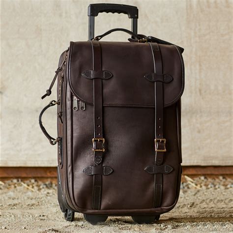 Filson Weatherproof Rolling Carry-On Bag-Medium Leather 11070439, a leather suitcase guaranteed ...