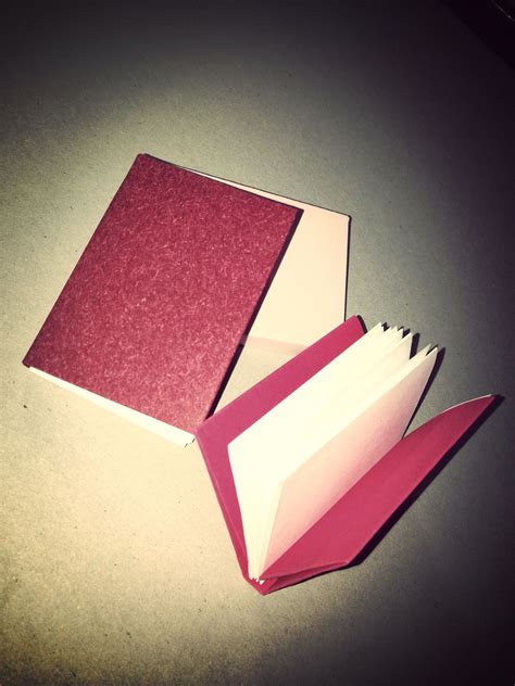 How to Make an Origami Book | Book origami, Origami guide, Handmade books