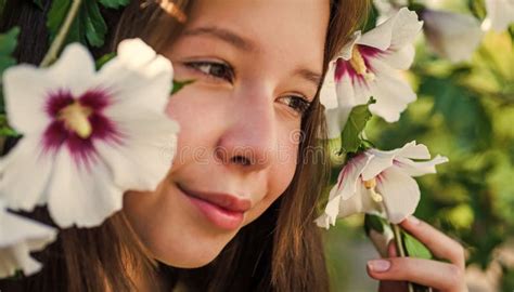 Girl with Hibiscus Bush Flower in Spring Blooming Season or Summer ...