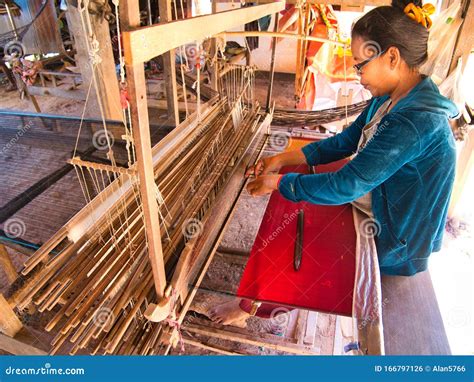 A Female Weaver Producing Silk Fabric on a Traditional Hand Loom on ...