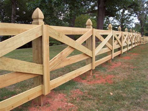 Custom wood crossbuck horse fence design by Mossy Oak Fence Company | Horse Fence Designs ...