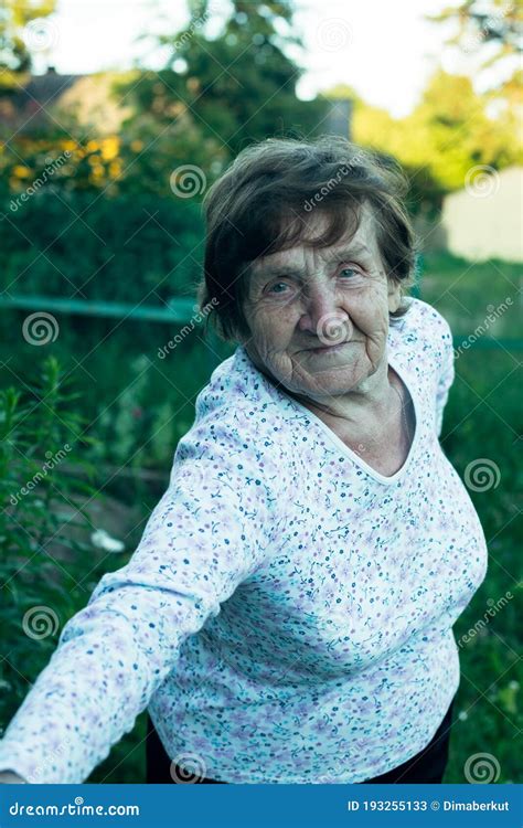 Portrait of an Old Woman, in the Village Outdoors. Stock Image - Image ...