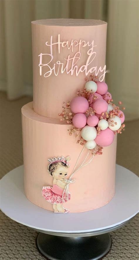 25 Baby Girl First Birthday Cake Ideas : Smooth Two-Tiered Birthday Cake with Balloons | Baby ...