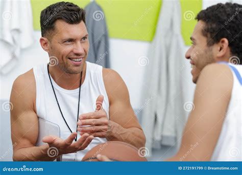 Handsome Sportmen Talking in Locker Room at Gym Stock Image - Image of hanger, health: 272191799