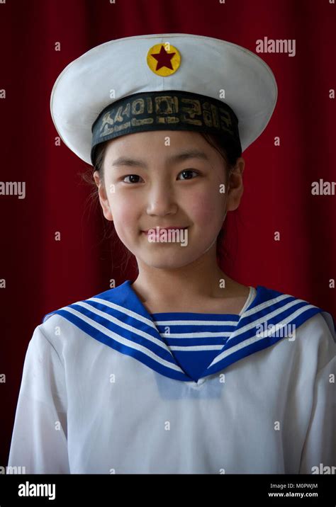 North Korean girl with a navy sailor uniform for a school show, Pyongan Province, Pyongyang ...