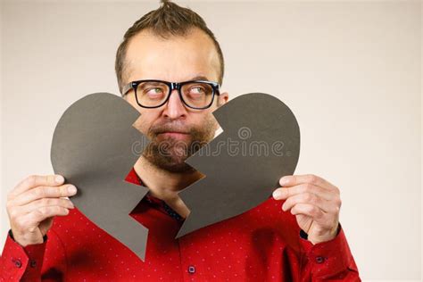 Sad man with broken heart stock image. Image of heartbreak - 151706479