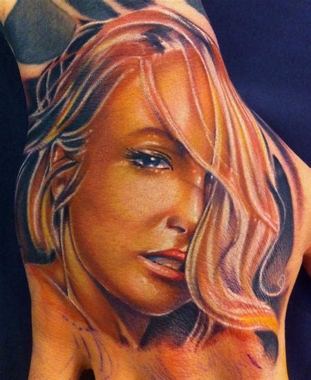 Pinup color portrait hand tattoo by Mike Demasi: TattooNOW
