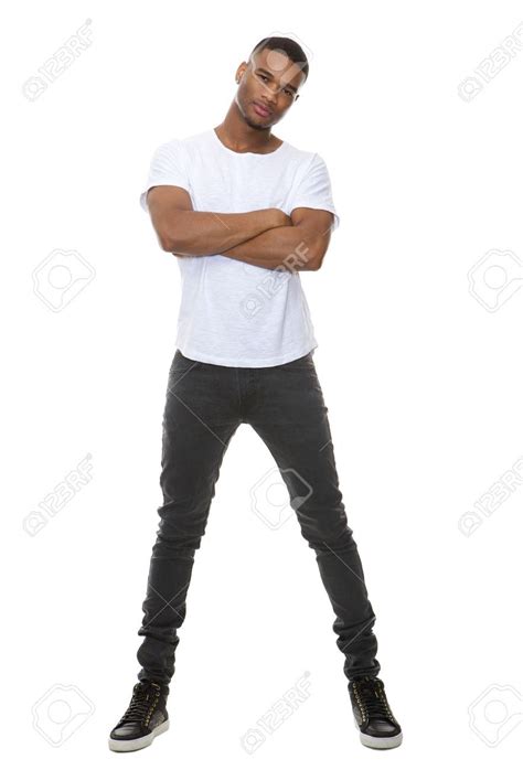 Full Length Portrait Of A Confident Young Man Posing With Arms.. Stock ...