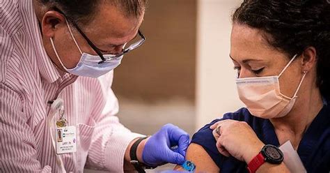 A nurse at McKenzie-Willamette Medical Center received the first COVID-19 vaccines in the county ...