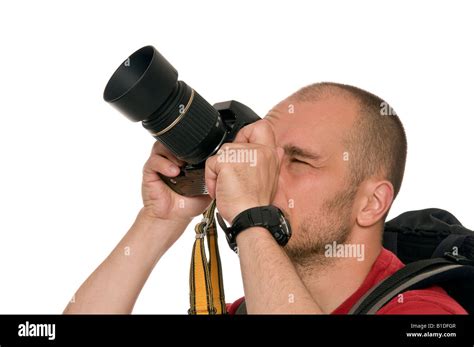 Tourist man photographing Stock Photo - Alamy