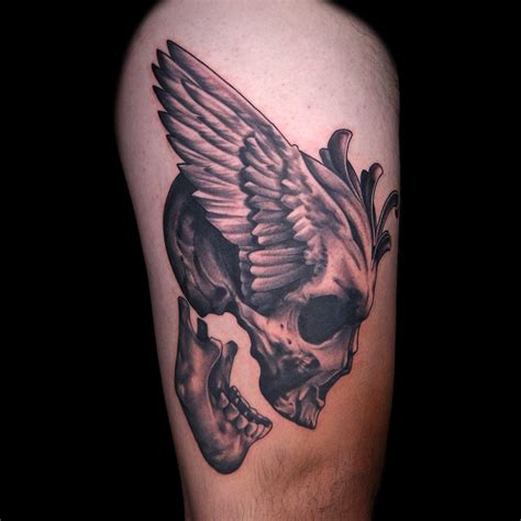 Skull & Wing Tattoo by Midwest Team | Wing tattoo, Tattoos, Skull tattoo