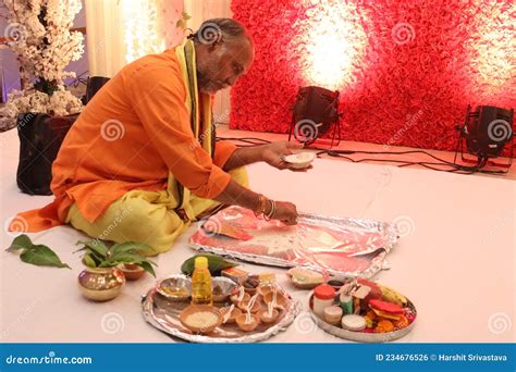 A Hindu Priest or Pandit is Preparing for the Traditional Ritual on an ...