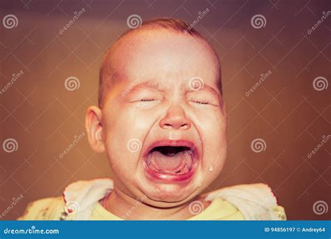 Portrait Of A Crying Baby. Tears On The Face Stock Image | CartoonDealer.com #94856197