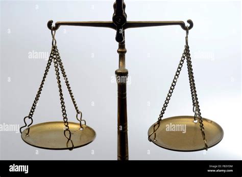 Old Golden weighing scale balance Stock Photo - Alamy