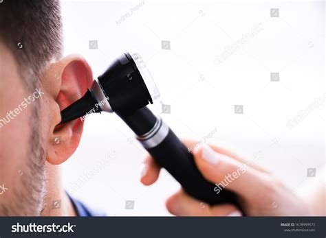 Close-up Female Doctor Examining Patients Ear Stock Photo 1678999573 | Shutterstock