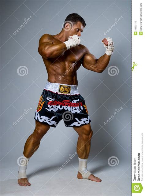 An Experienced Fighter Kickboxer In A Fighting Stance. Royalty Free Stock Image - Image: 32572116
