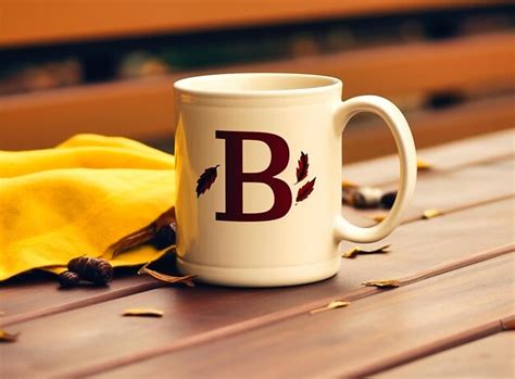 Premium Photo | A black and white coffee mug with the word be and ...