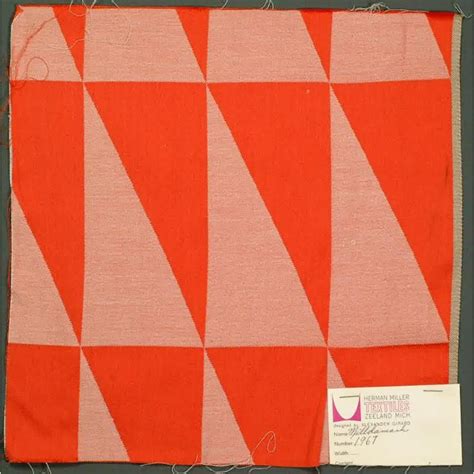 an orange and white checkered cloth with a black border