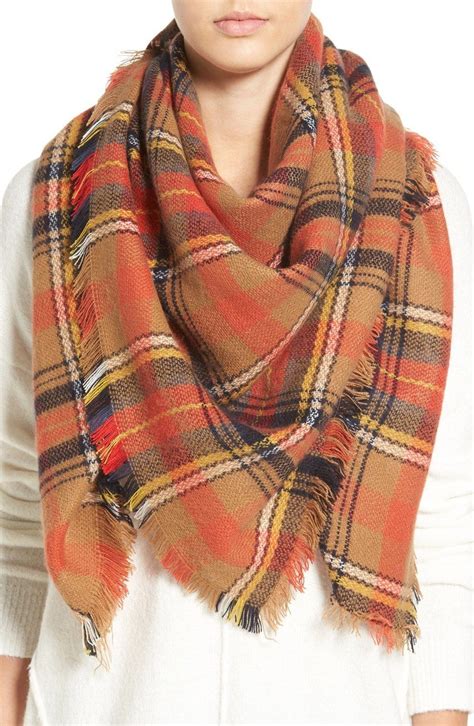 Definitely needing this plaid scarf that stands out with its autumn colors! On the Nordstrom ...