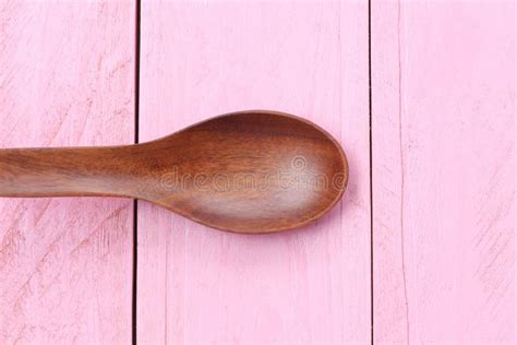 Wooden Spoon on Pink Wood Floors. Stock Image - Image of handmade ...