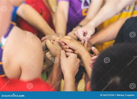 Team of Kids Children Basketball Players Stacking Hands in the Court ...