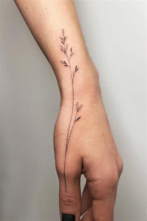 55 Meaningful Fine Line Tattoos for Minimalist Women