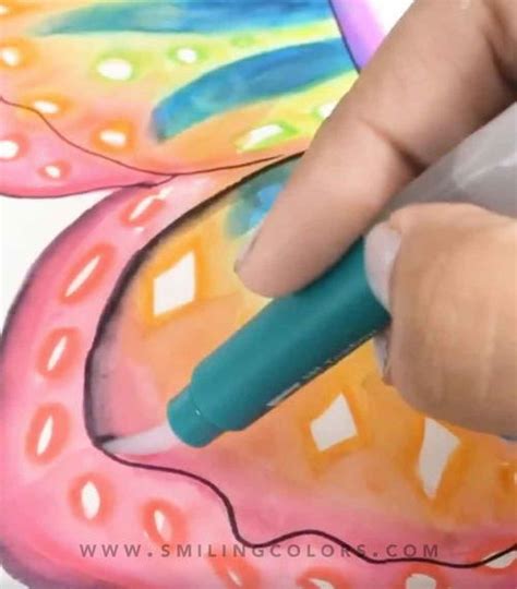 Painting A Butterfly In Rainbow Colors | FaveCrafts.com