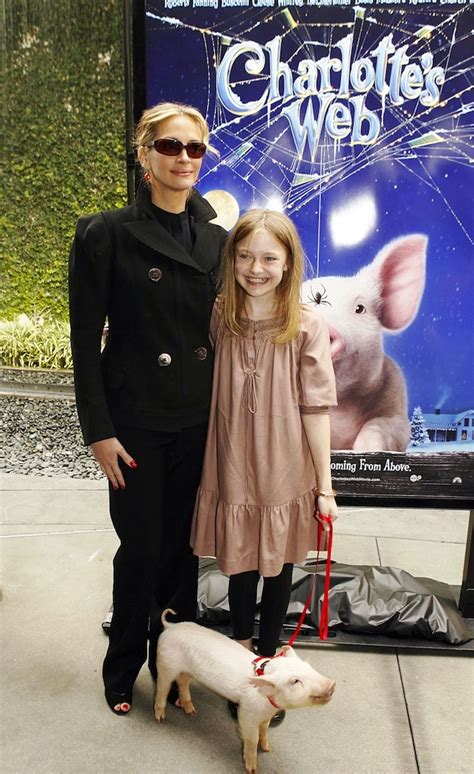 Julia Roberts, Dakota Fanning, and Charlotte the Pig at the movie premiere of "Charlotte's Web ...