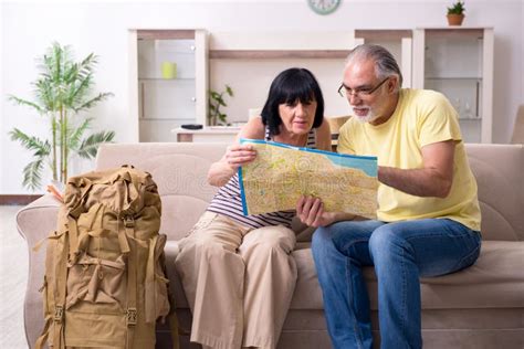 Old Couple Preparing for Vacation Travel Stock Photo - Image of journey ...