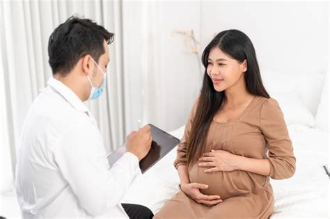 Free Stock Photo of Happy pregnant woman at checkup | Download Free Images and Free Illustrations