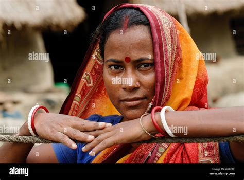 INDIA, Ganges river delta Sundarbans in West-Bengal , Sagar Island, Bengali woman in sari ...