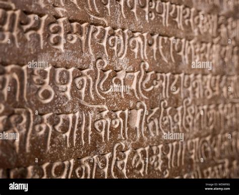 Detail of ancient writing on stone tablet at the Khajuraho Group of Monuments, Khajuraho, Madhya ...